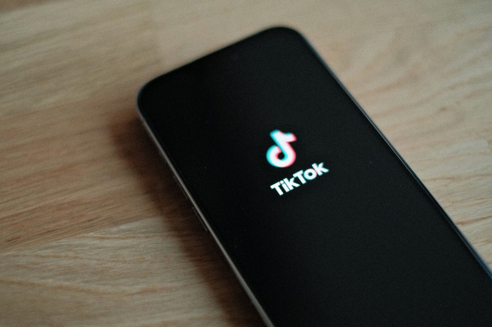 a phone shows the tiktok logo